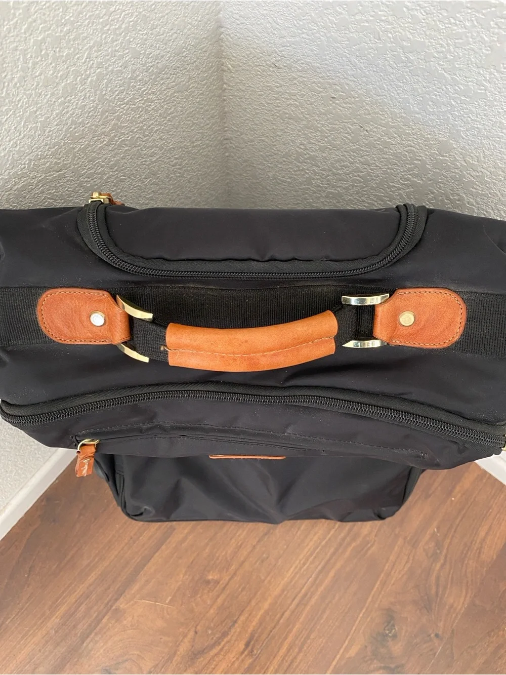 Bric's Milano X-Travel 21” Black Carry-On Spinner Luggage w/ Tan Leather Accents